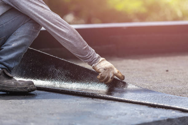 Professional Basement Waterproofing technician working in Jefferson, MD